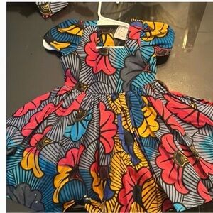 Elisamama multi colored mommy and me matching dresses.